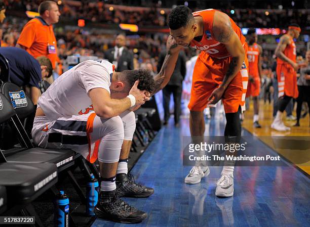 virginia-guard-london-perrantes-left-is-consoled-by-syracuse-forward-michael-gbinije-after.jpg