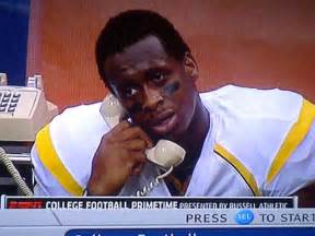 geno smith on phone.jpg