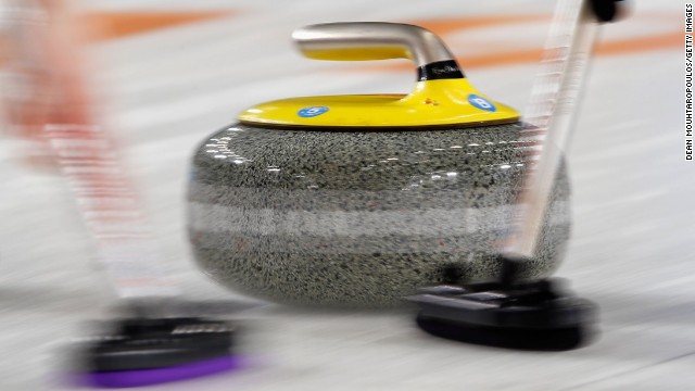 130925160358-sweeping-a-curling-stone-horizontal-gallery.jpg