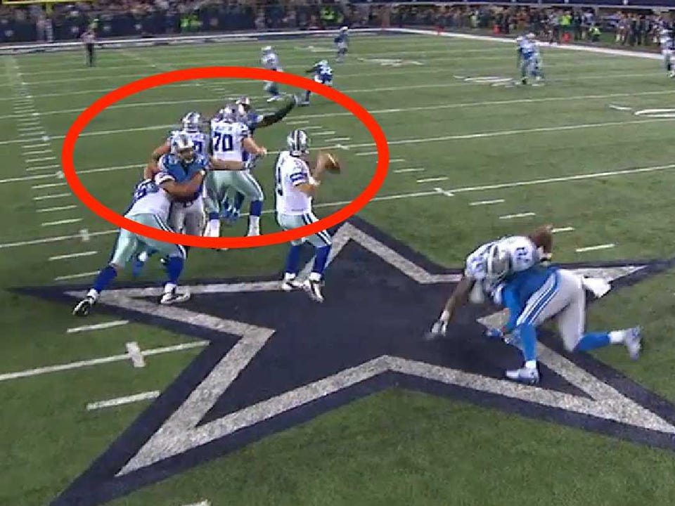 cowboys-lions-suh-hold.jpg