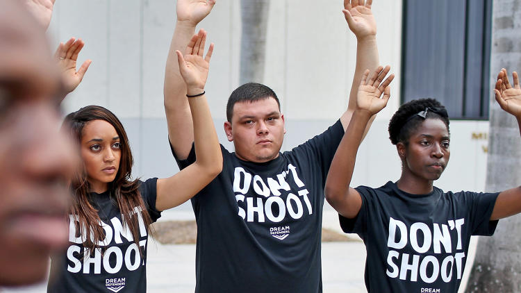 3034486-slide-p-1-hands-up-dont-shoot.jpg