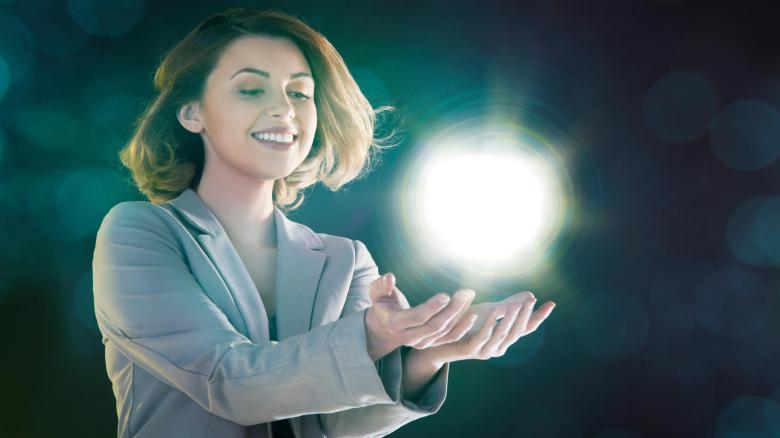 Young-woman-holding-ball-of-light.jpg