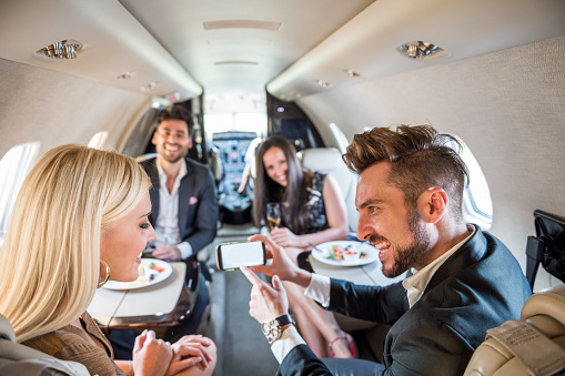 passengers-inside-private-jet-airplane-picture-id500669776