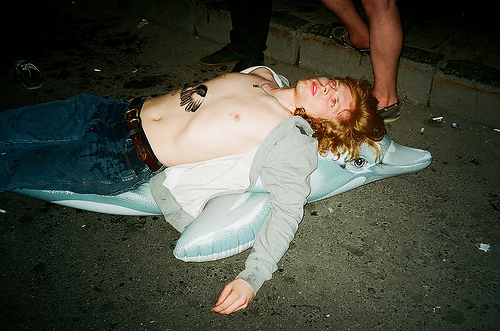 boy-dolphin-drunk-night-pavement-sidewalk-Favim.com-106109.jpg