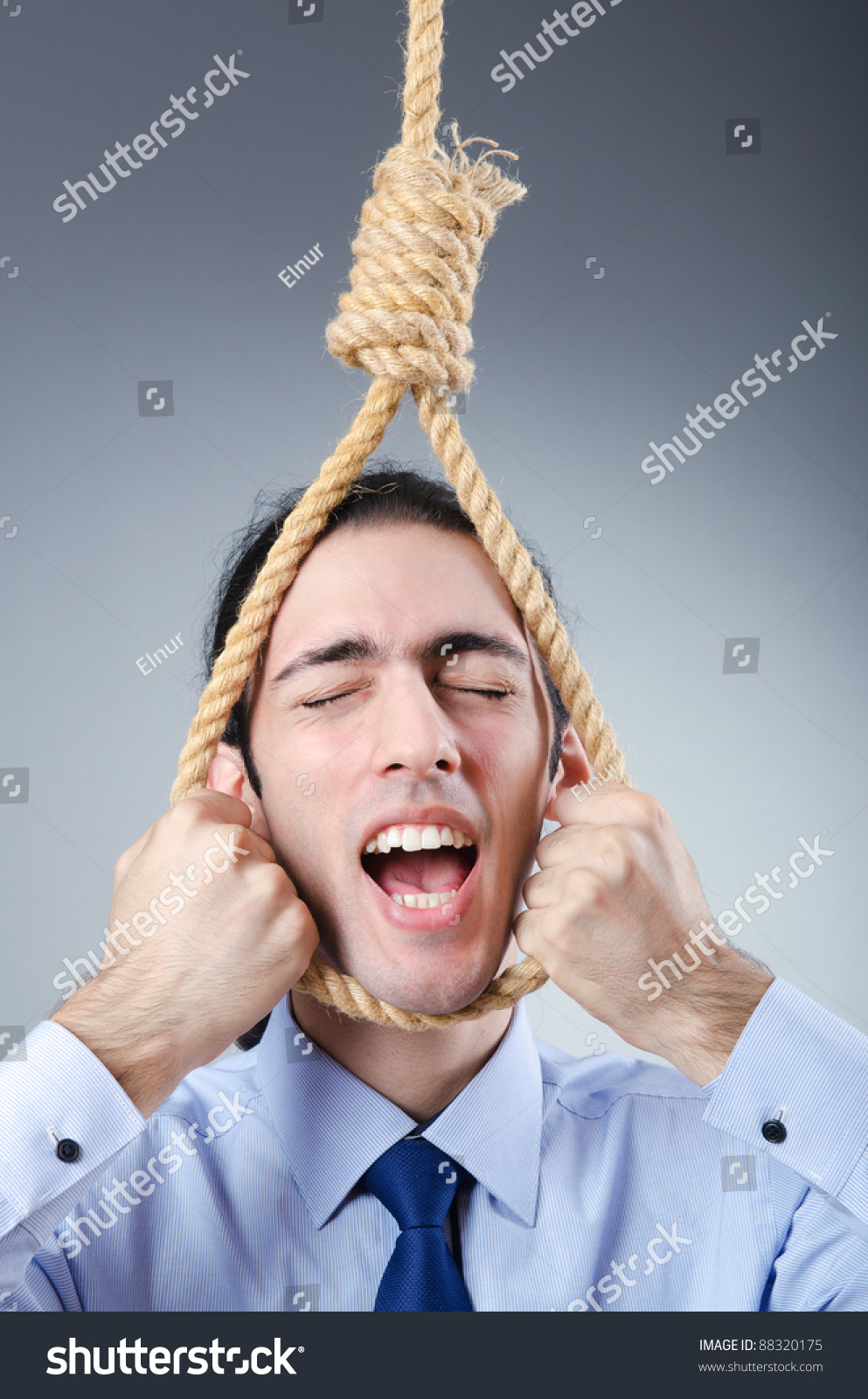 stock-photo-businessman-committing-suicide-through-hanging-88320175.jpg
