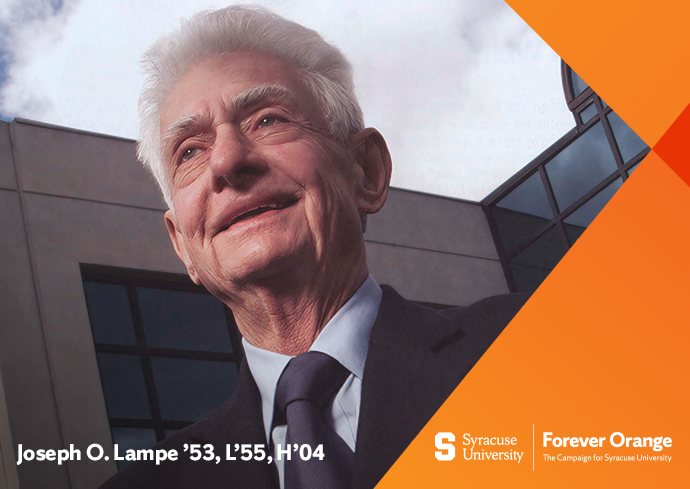 A man smiles for a headshot outdoors.