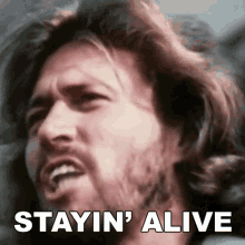 stayin-alive-barry-gibb.gif