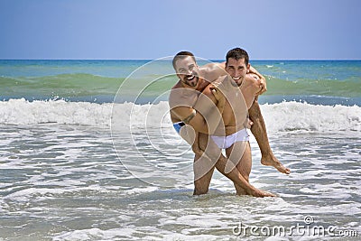 two-gay-men-beach-vacation-5932115.jpg