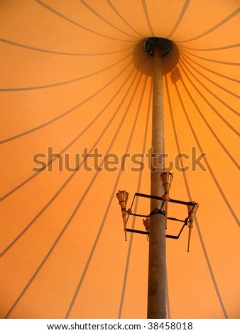 stock-photo-big-orange-tent-of-a-circus-inside-38458018.jpg