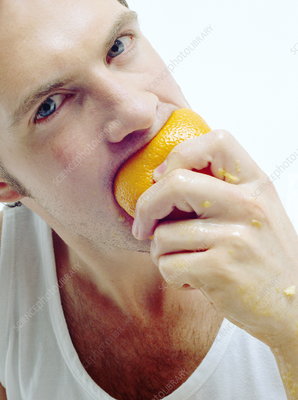 P9200389-Man_eating_orange-SPL.jpg