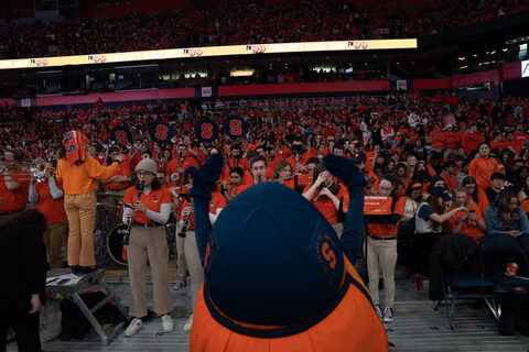 Syracuse mascot Otto the Orange dances to music from the Sour Sitrus Society Pep Band. The ensemble created its loudest sound of the season by allowing additional members not assigned to the game to perform. 