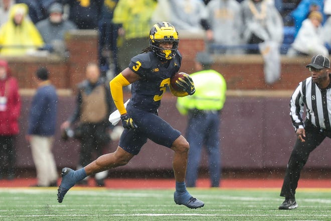 Michigan defensive back Keon Sabb runs after intercepting a ball from Indiana during the second half of U-M's 52-7 win over Indiana on Saturday, Oct. 14, 2023, in Ann Arbor.