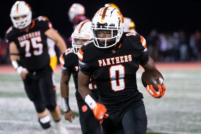Central York's Juelz Goff carries the ball for the Panthers on a touchdown-scoring run during a YAIAA Division I football game against Red Lion at Central York High School on Friday, Oct. 14, 2022. 